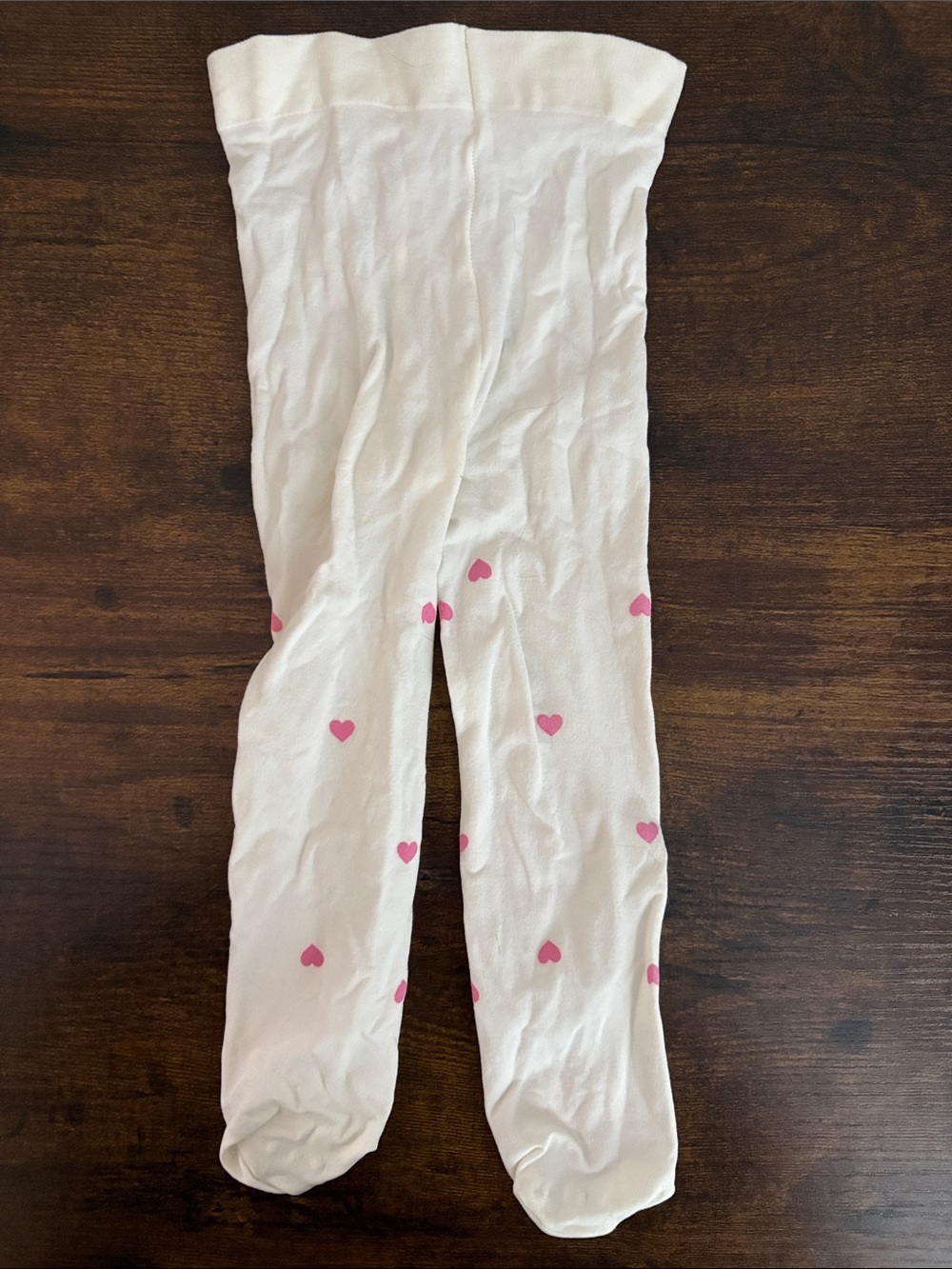 Carter’s white tights with pink hearts